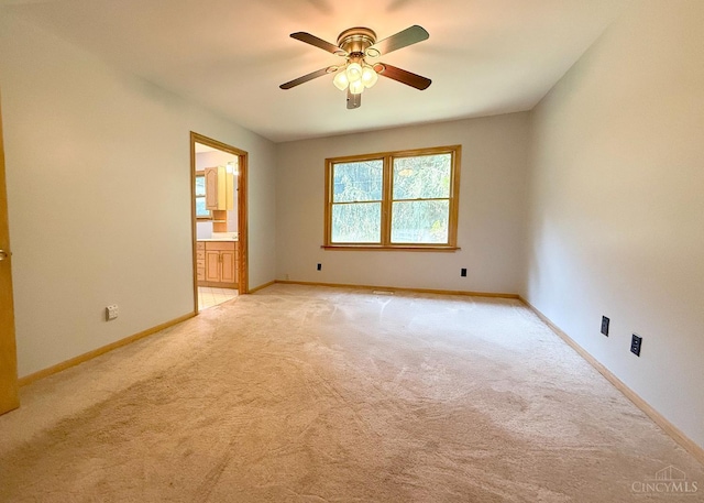 945 Lazenby Rd, Washington Twp, OH 45148 - empty room with light colored carpet and ceiling fan