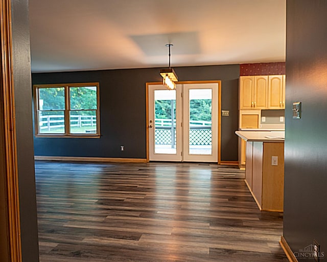 945 Lazenby Rd, Washington Twp, OH 45148 - unfurnished dining area featuring dark wood-style floors and plenty of natural light