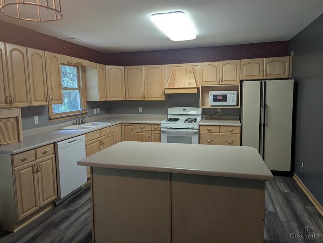 945 Lazenby Rd, Washington Twp, OH 45148 - kitchen with white appliances, premium range hood, light brown cabinetry, dark wood-style flooring, and light countertops