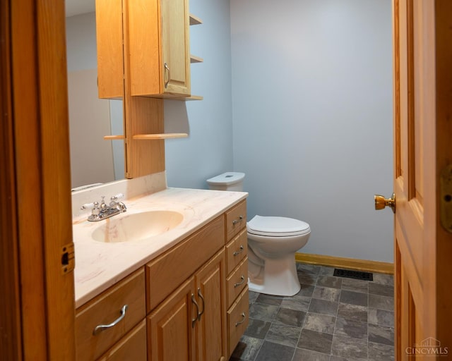 945 Lazenby Rd, Washington Twp, OH 45148 - half bathroom featuring vanity and toilet