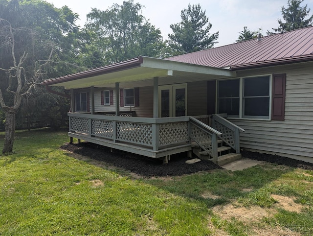 945 Lazenby Rd, Washington Twp, OH 45148 - rear view of property featuring a lawn and a metal roof