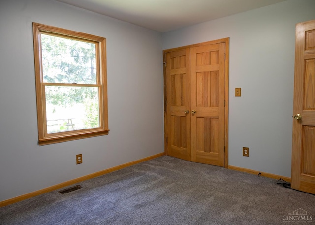 945 Lazenby Rd, Washington Twp, OH 45148 - unfurnished bedroom with carpet floors and baseboards