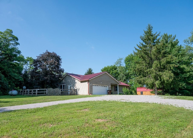 945 Lazenby Rd, Washington Twp, OH 45148 - single story home featuring a garage and gravel driveway