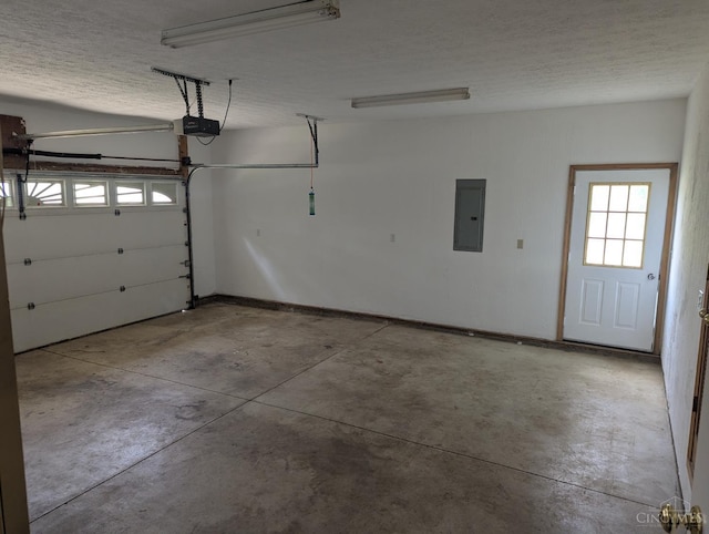 945 Lazenby Rd, Washington Twp, OH 45148 - garage featuring electric panel and a garage door opener