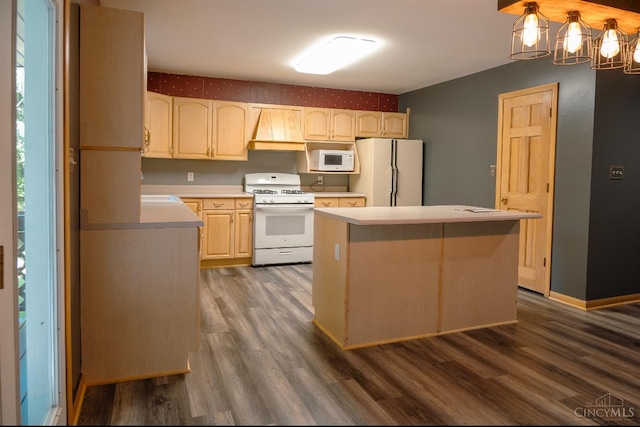 945 Lazenby Rd, Washington Twp, OH 45148 - kitchen with white appliances, premium range hood, dark wood-style flooring, light countertops, and a kitchen island