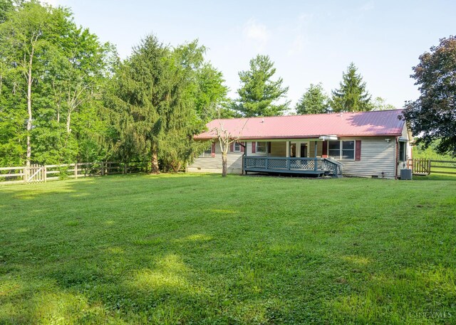 945 Lazenby Rd, Washington Twp, OH 45148 - back of property with a fenced backyard, a metal roof, and crawl space