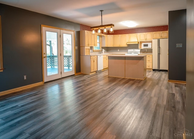 945 Lazenby Rd, Washington Twp, OH 45148 - kitchen featuring white appliances, a center island, dark wood-type flooring, light countertops, and pendant lighting