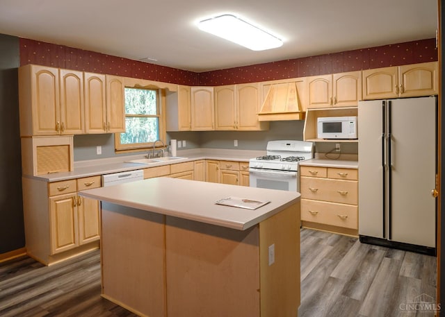 945 Lazenby Rd, Washington Twp, OH 45148 - kitchen featuring white appliances, light brown cabinets, custom exhaust hood, wood finished floors, and wallpapered walls
