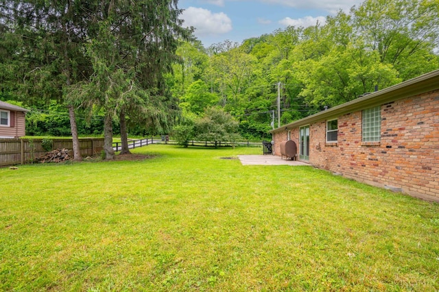 8385 Bridle Rd, Anderson Twp, OH 45244 - fenced backyard with a patio area