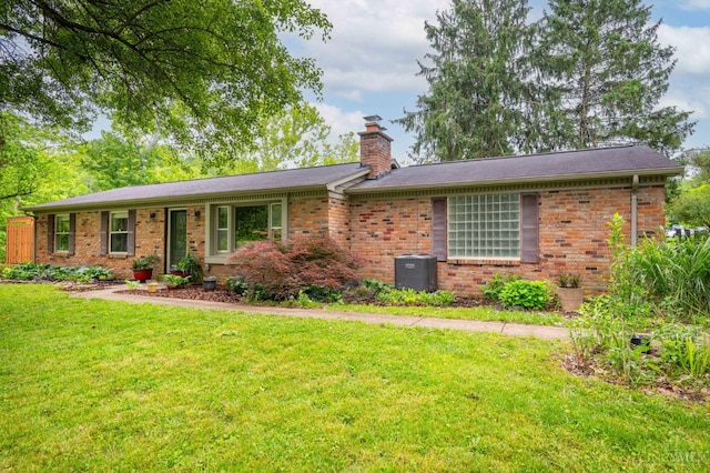 8385 Bridle Rd, Anderson Twp, OH 45244 - ranch-style house with a chimney, a front lawn, and brick siding