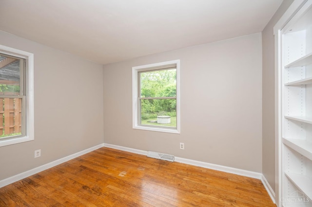 8385 Bridle Rd, Anderson Twp, OH 45244 - spare room with baseboards and light wood-type flooring