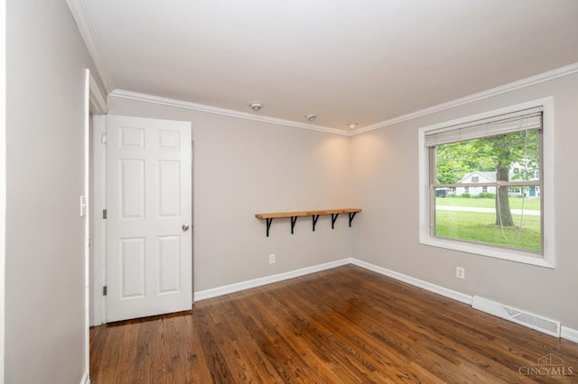 8385 Bridle Rd, Anderson Twp, OH 45244 - spare room with dark wood finished floors and crown molding