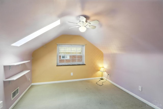 1006 Harbury Dr, Springfield Twp, OH 45224 - bonus room featuring a skylight, a ceiling fan, lofted ceiling, and carpet floors