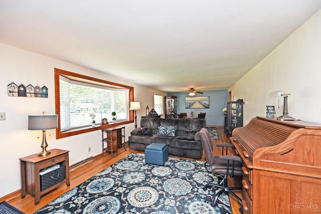 3638 El Rego Dr, Pierce Twp, OH 45102 - living area featuring wood finished floors and ceiling fan