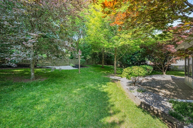 125 Sackett Dr, Monroe, OH 45050 - fenced backyard with a patio
