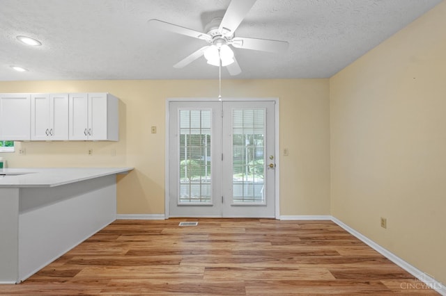 125 Sackett Dr, Monroe, OH 45050 - unfurnished dining area with light wood-style floors, a textured ceiling, a ceiling fan, and recessed lighting