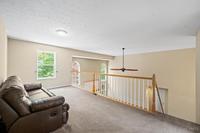 125 Sackett Dr, Monroe, OH 45050 - sitting room featuring carpet floors, plenty of natural light, and a ceiling fan