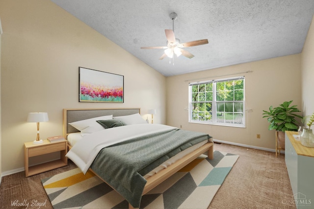 125 Sackett Dr, Monroe, OH 45050 - carpeted bedroom with lofted ceiling, a textured ceiling, and a ceiling fan