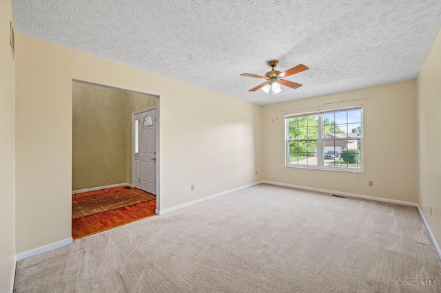 125 Sackett Dr, Monroe, OH 45050 - carpeted spare room with ceiling fan and a textured ceiling