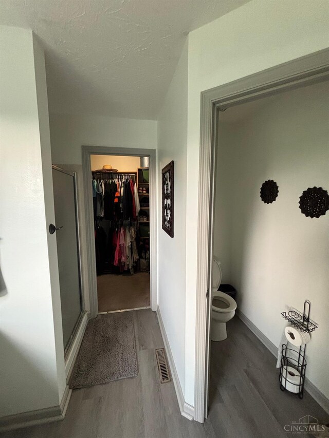 742 Miami Way Dr, Hamilton, OH 45013 - corridor featuring wood finished floors and a textured ceiling
