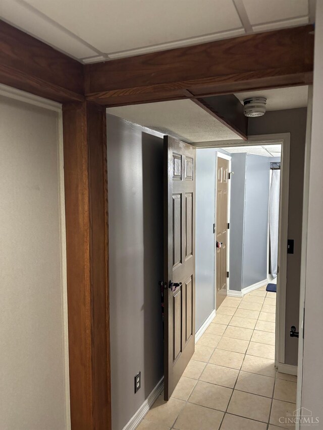742 Miami Way Dr, Hamilton, OH 45013 - hallway with light tile patterned flooring and baseboards