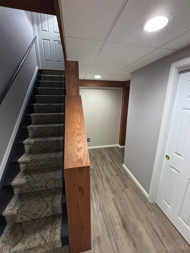 742 Miami Way Dr, Hamilton, OH 45013 - stairway featuring wood finished floors and baseboards