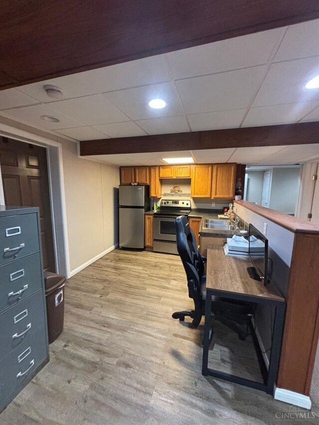 742 Miami Way Dr, Hamilton, OH 45013 - home office featuring light wood-type flooring and a paneled ceiling