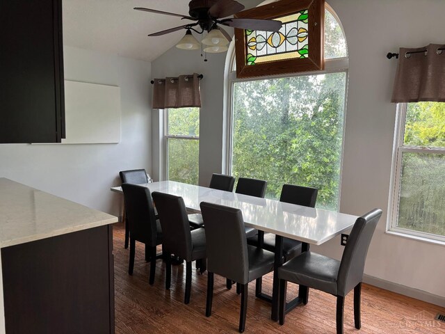 742 Miami Way Dr, Hamilton, OH 45013 - dining space featuring ceiling fan, wood finished floors, vaulted ceiling, and plenty of natural light