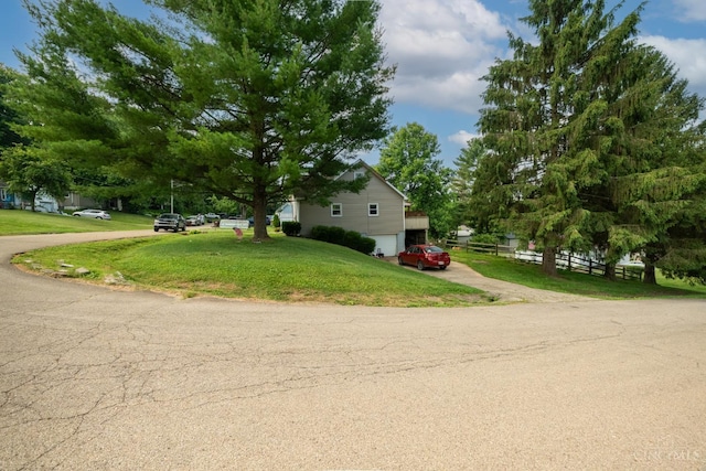 251 Westview Dr, Morrow, OH 45152 - view of home's exterior featuring a garage and driveway