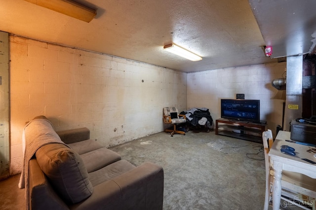 251 Westview Dr, Morrow, OH 45152 - living room featuring unfinished concrete floors and concrete block wall