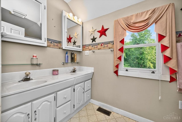 1001 Shawhan Rd, Union Twp, OH 45152 - full bathroom featuring double vanity, tile patterned floors, and vaulted ceiling