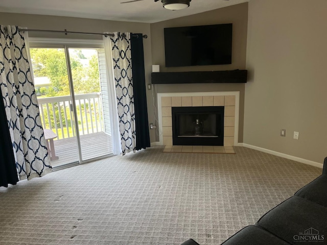 12061 Carrington Ln Unit 206, Symmes Twp, OH 45140 - carpeted living room with baseboards and a fireplace
