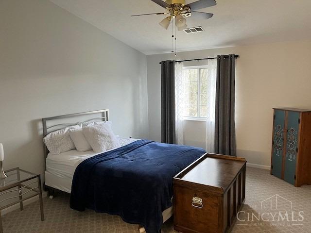 12061 Carrington Ln Unit 206, Symmes Twp, OH 45140 - bedroom with light colored carpet and ceiling fan
