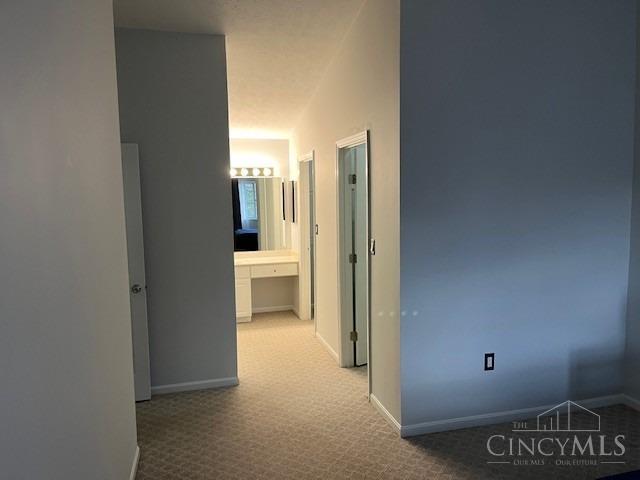 12061 Carrington Ln Unit 206, Symmes Twp, OH 45140 - hall with carpet flooring and baseboards