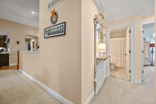 18092 Horizon Way, Lawrenceburg, IN 47025 - hallway with light colored carpet, ornamental molding, and recessed lighting