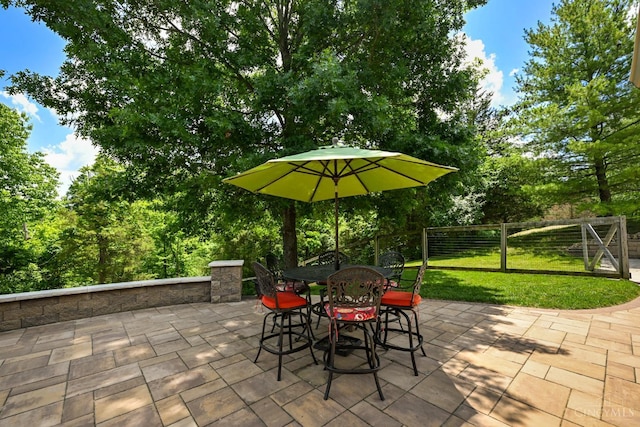 18092 Horizon Way, Lawrenceburg, IN 47025 - view of patio featuring outdoor dining space and view of wooded area