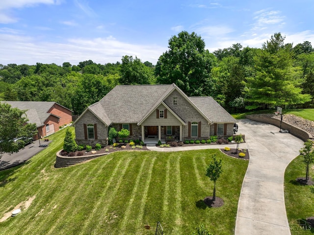 18092 Horizon Way, Lawrenceburg, IN 47025 - view of front facade featuring stone siding, a front yard, and covered porch