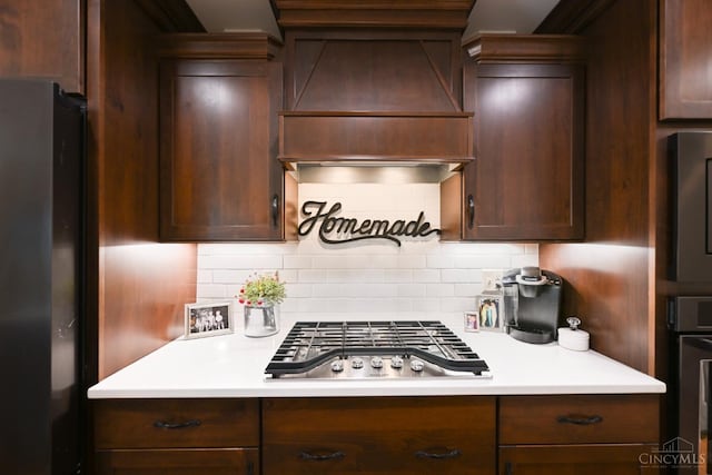 18092 Horizon Way, Lawrenceburg, IN 47025 - kitchen with black appliances, custom exhaust hood, light countertops, and decorative backsplash