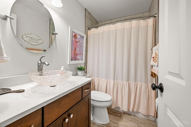18092 Horizon Way, Lawrenceburg, IN 47025 - bathroom featuring vanity, curtained shower, and wood finished floors