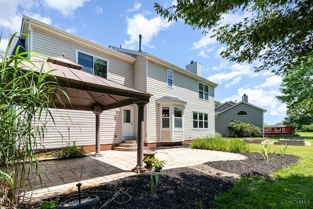 7693 Misty Springs Ct, Deerfield Twp, OH 45040 - back of house featuring a gazebo, a patio, a chimney, and a yard