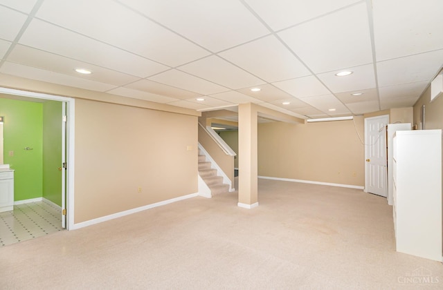7693 Misty Springs Ct, Deerfield Twp, OH 45040 - finished basement with recessed lighting, light carpet, stairs, and a paneled ceiling