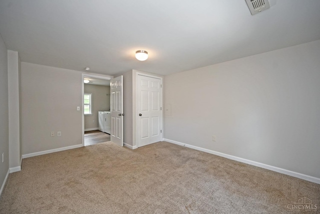 5782 Buckwheat Rd, Miami Twp, OH 45150 - carpeted empty room featuring washer / clothes dryer and baseboards