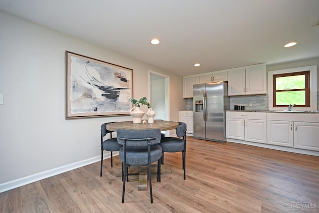 5782 Buckwheat Rd, Miami Twp, OH 45150 - dining area featuring light wood-style floors and recessed lighting