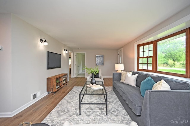 5782 Buckwheat Rd, Miami Twp, OH 45150 - living area featuring baseboards and wood finished floors
