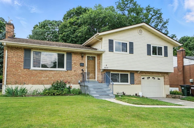 9015 Cotillion Dr, Springfield Twp, OH 45231 - split level home featuring a garage, concrete driveway, brick siding, and a front yard