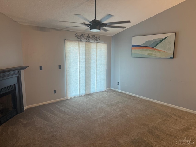 7912 Jessies Way Unit 304, Fairfield Twp, OH 45011 - unfurnished living room with ceiling fan, a fireplace, carpet, vaulted ceiling, and a textured ceiling