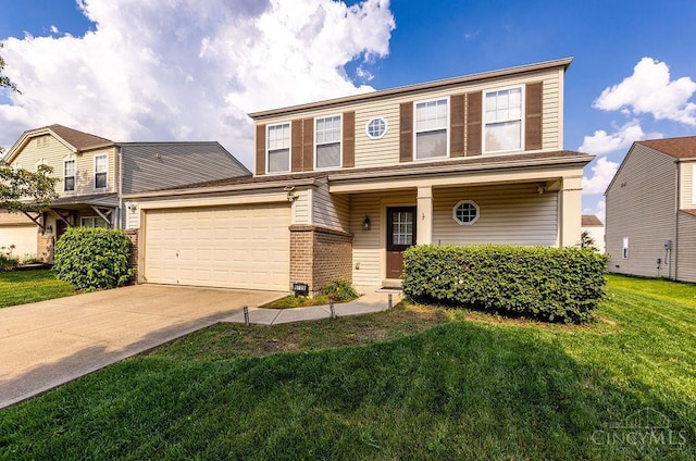 6706 Bedington Ln, Morrow, OH 45152 - view of front facade featuring a front lawn, concrete driveway, and a garage
