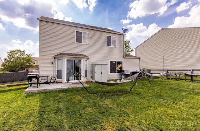 6706 Bedington Ln, Morrow, OH 45152 - back of property featuring a patio area and a fenced backyard