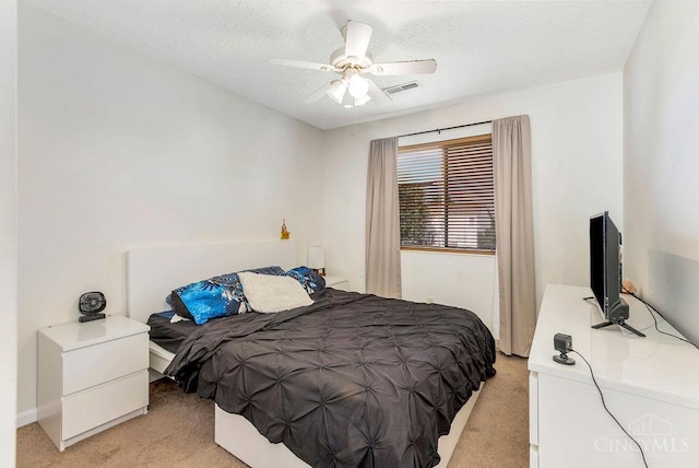 6706 Bedington Ln, Morrow, OH 45152 - bedroom with light colored carpet, a ceiling fan, and a textured ceiling