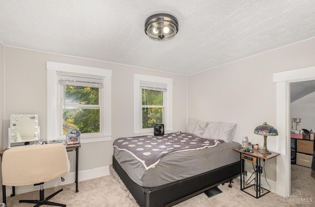 609 Coralie Ave, Hamilton, OH 45013 - bedroom with carpet, multiple windows, an office area, a textured ceiling, and ornamental molding